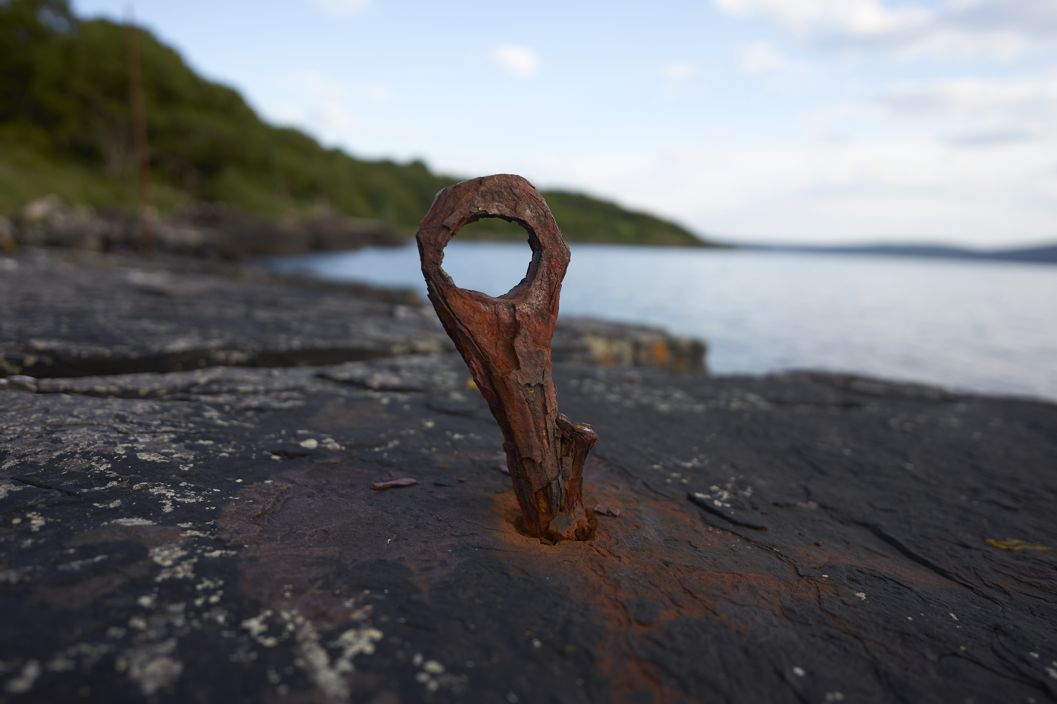 rusty anchor point at sunrise